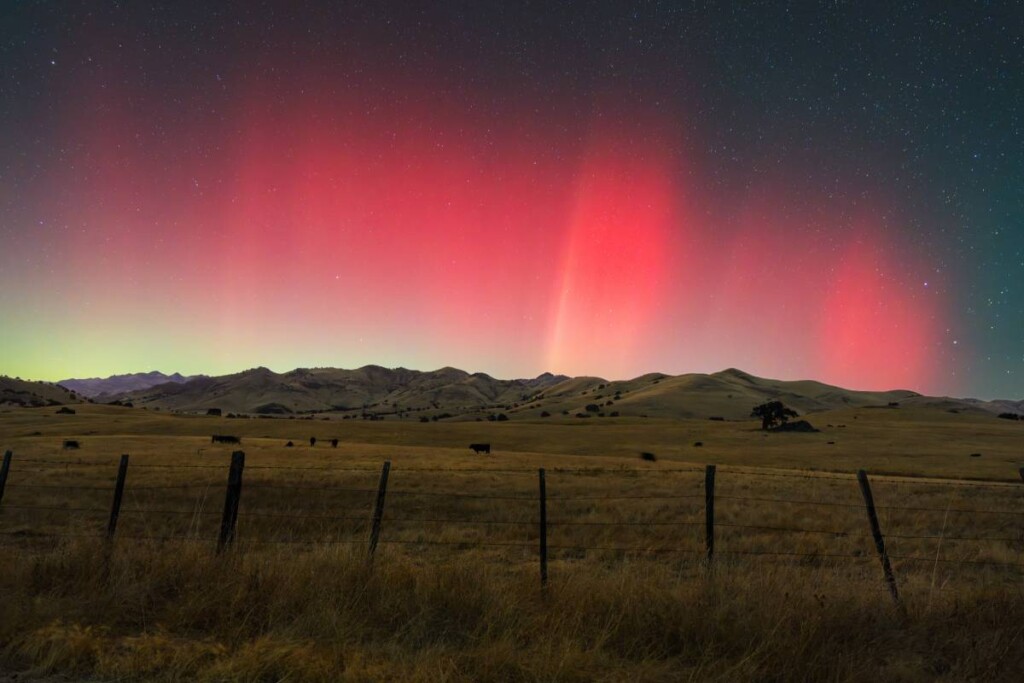 A fenced field at night in a farm for sale near Hollister, California (CA)