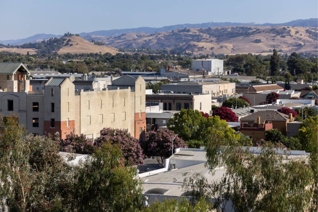 A wide distant photo of homes in historic downtown Hollister, California (CA)